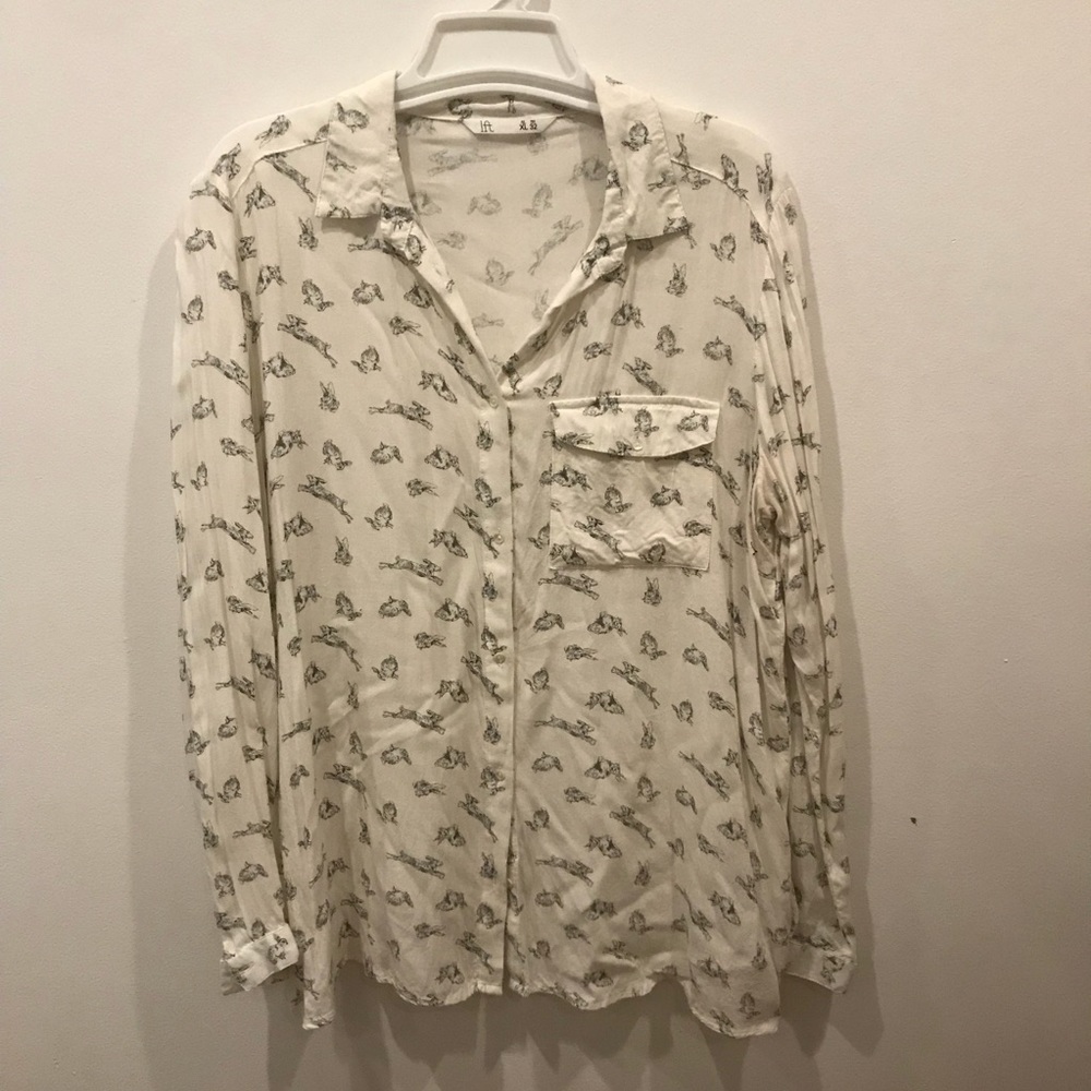 White/cream long sleeved shirt with bunnies